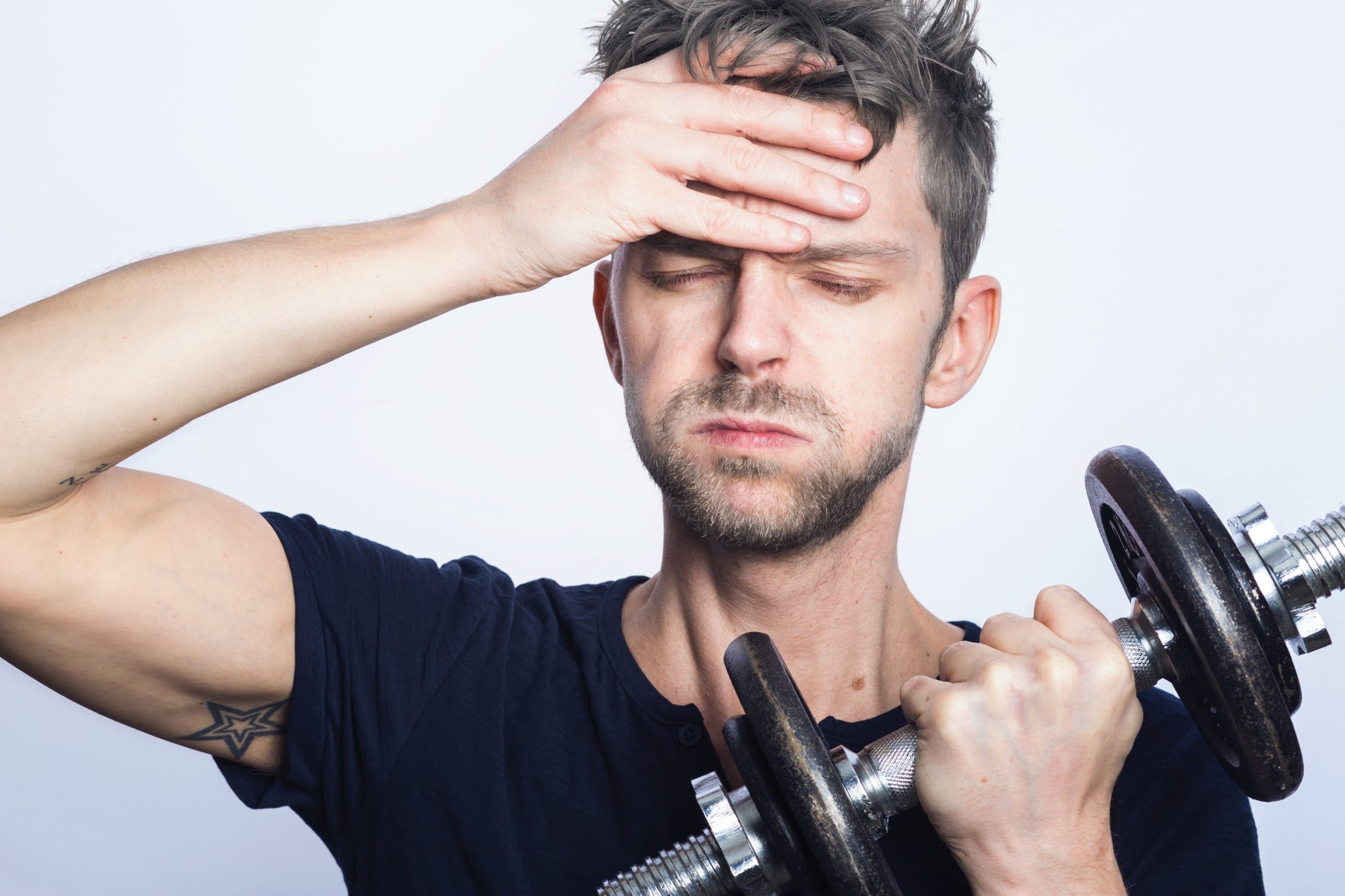 Man trying to motivate himself to work out